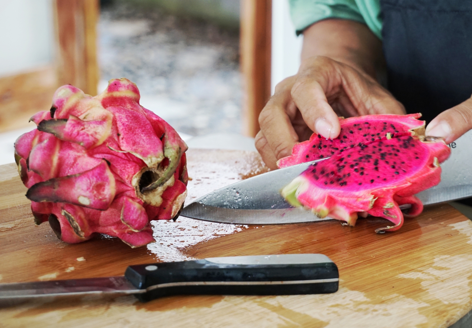 Dragon fruit being cut