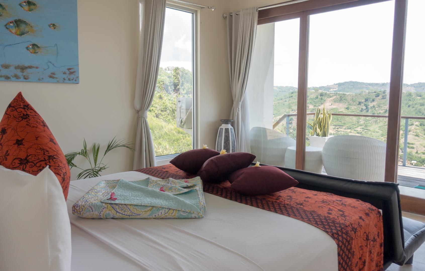 Master bedroom has a South Lombok mountain view
