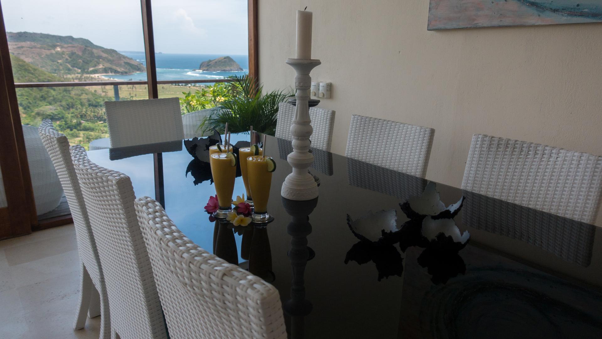 Villa Atas Pelangi dinner table with fresh juices and a view