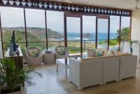 Sofa with a tv and a beautiful view over South Lombok