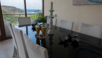 Villa Atas Pelangi dinner table with fresh juices and a view