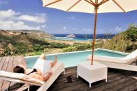 Relaxing next to the pool at Villa Atas Pelangi